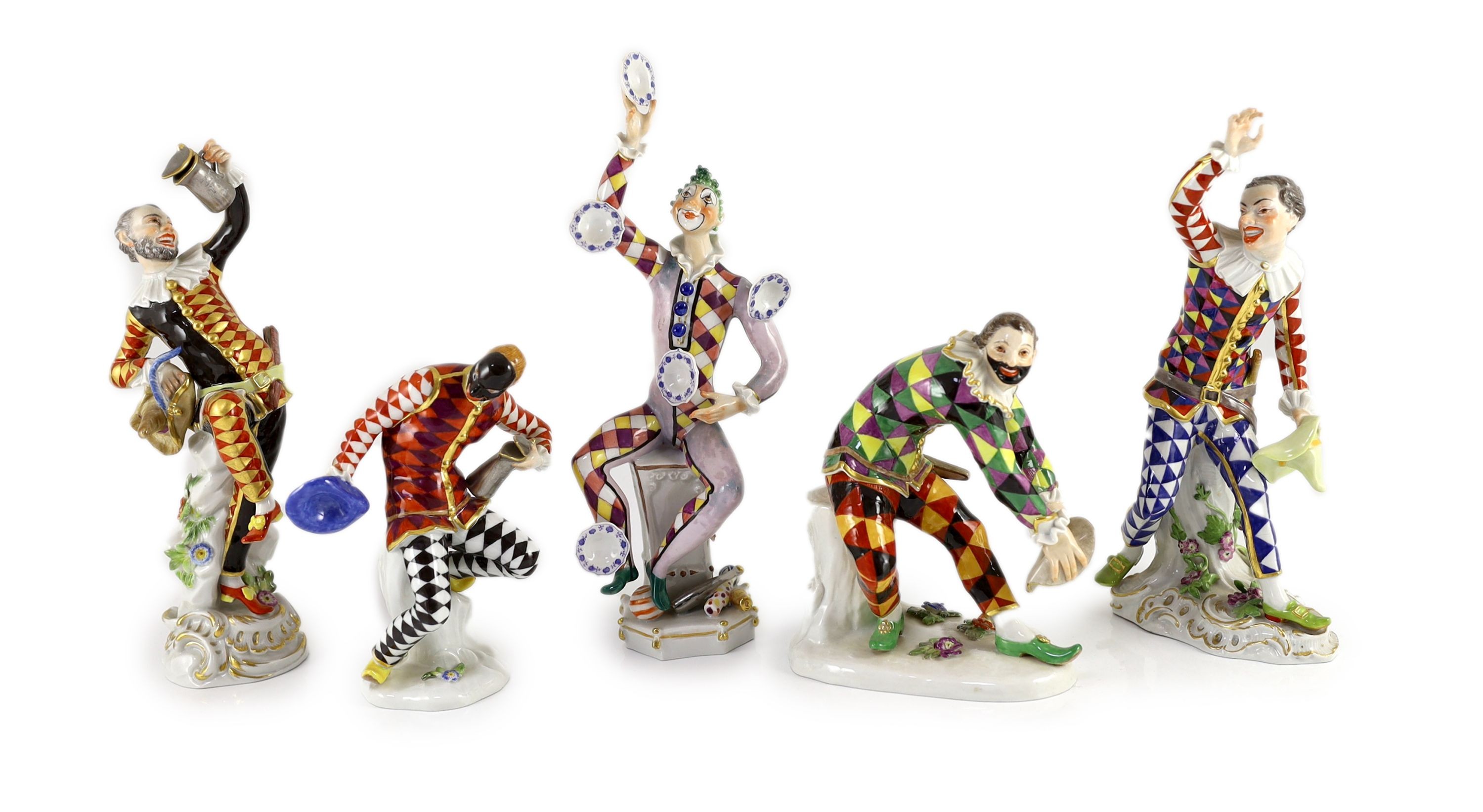 Five various Meissen figures of Harlequin, late 20th century, 15.5 cm – 26.5 cm